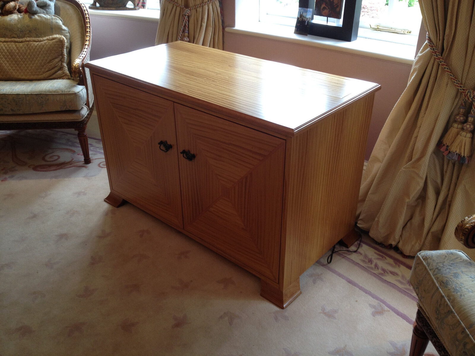 Honey oak sideboard with traditional brass handles