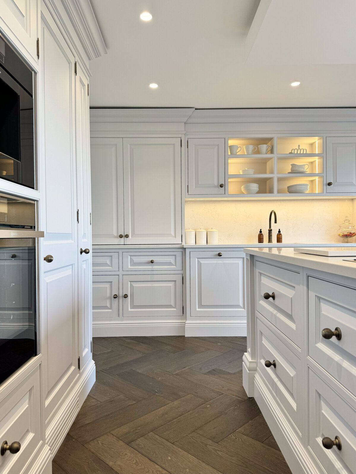 Shaker kitchen with lit display shelves